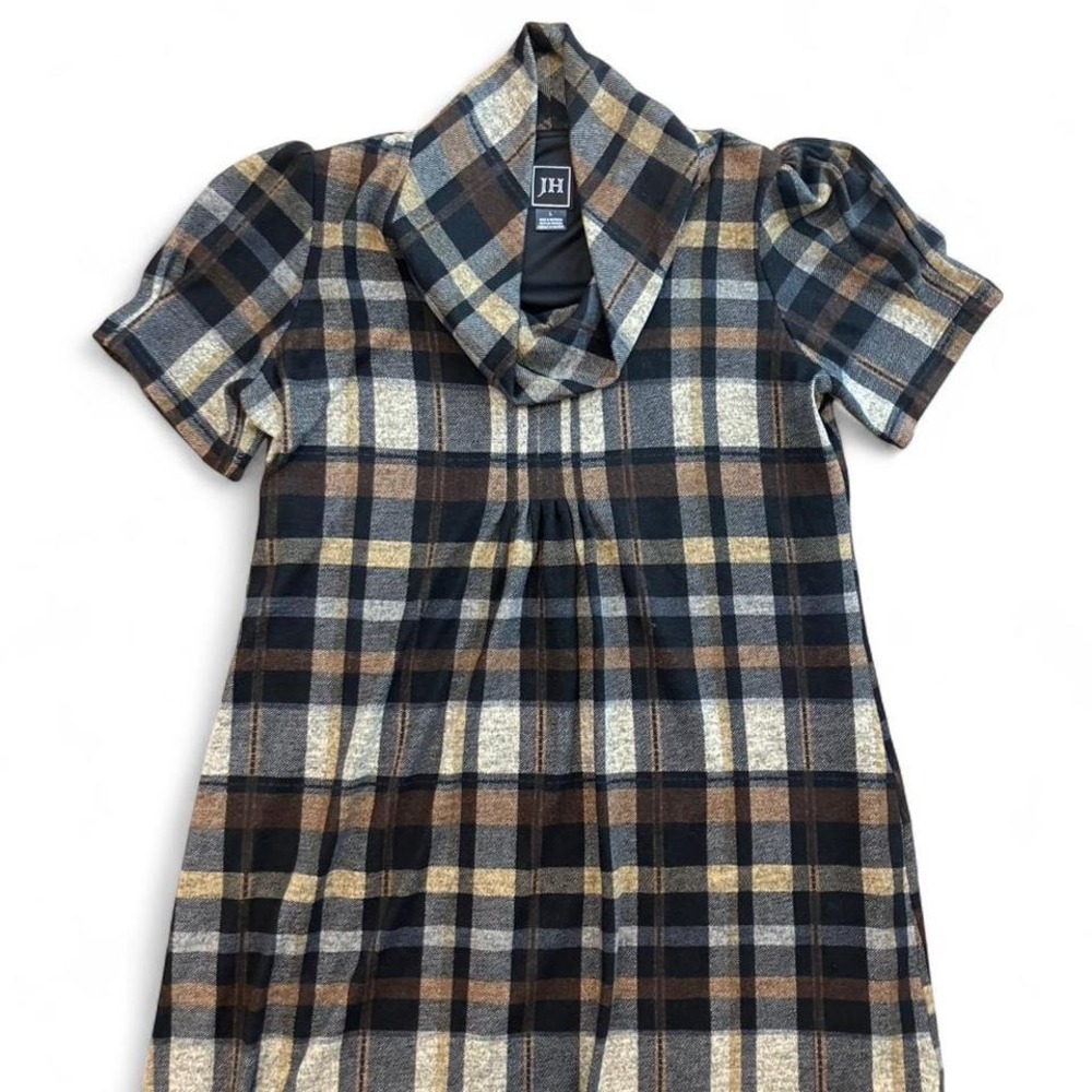 Plaid dress from JH, featuring a blend of warm tones and a cozy fabric